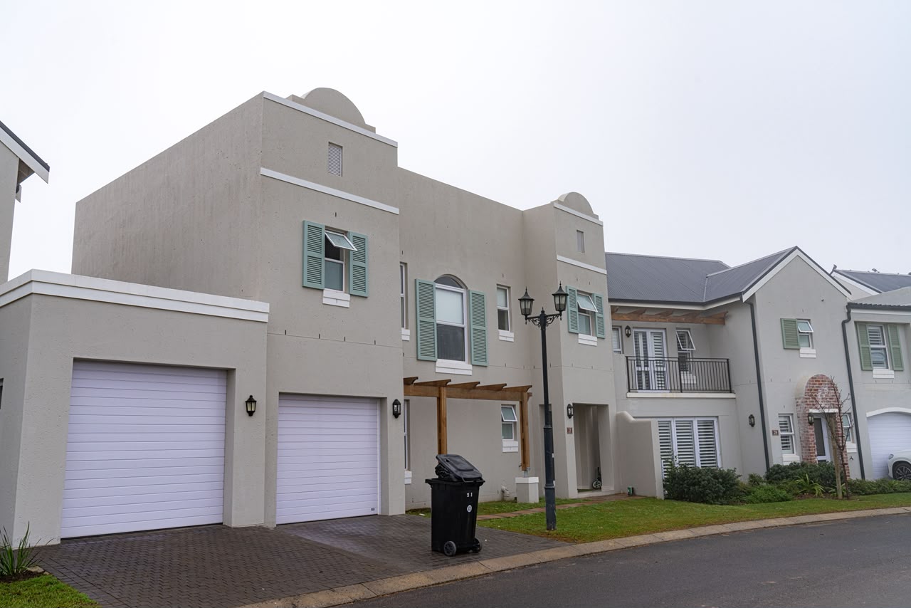 Completed homes with green shutters, Nooitgedacht