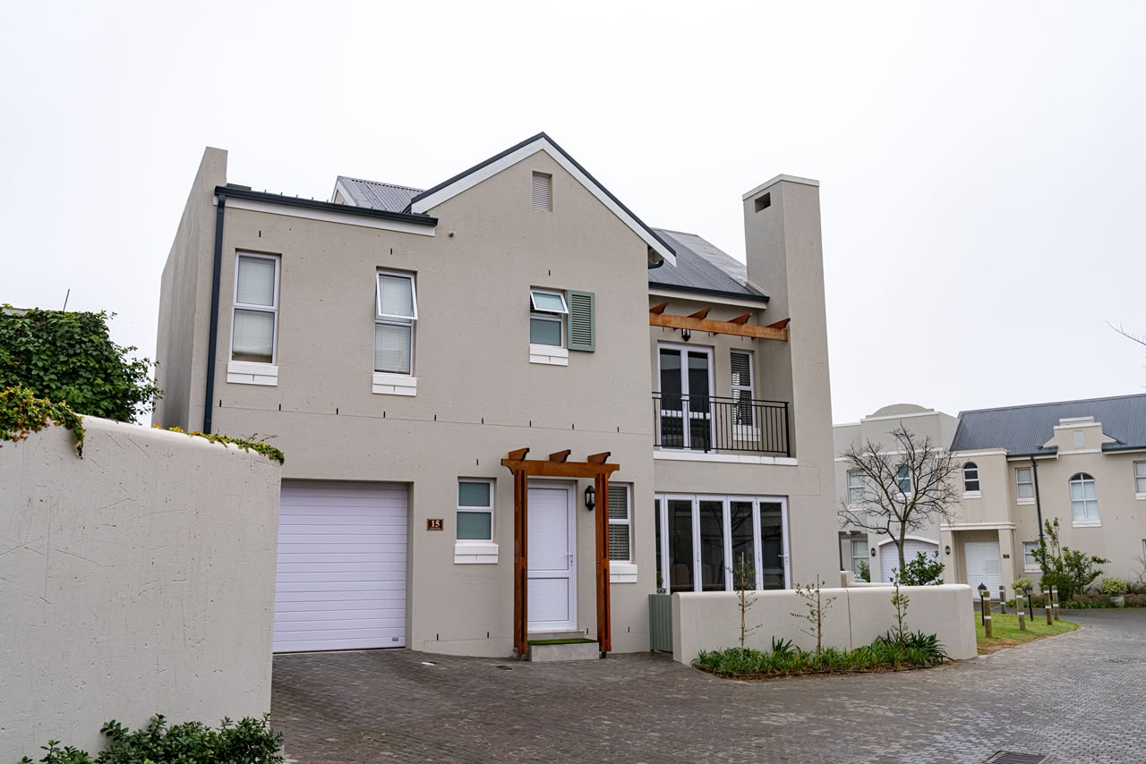 Completed gabled home with a timber pergola entrance, Nooitgedacht