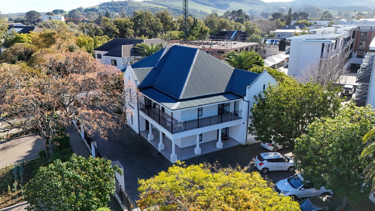 Completed student accommodation building with a wrap-around balcony, Stellenbosch