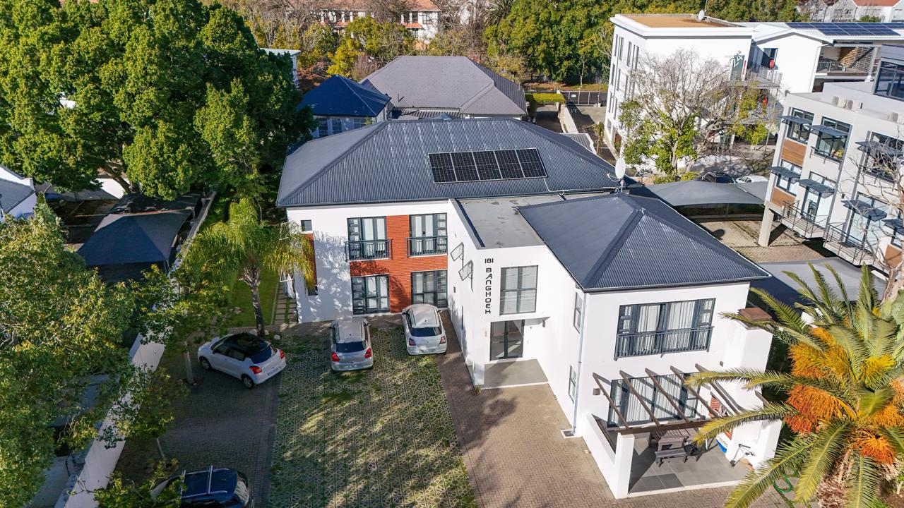Completed student accommodation building in a leafy street, Stellenbosch