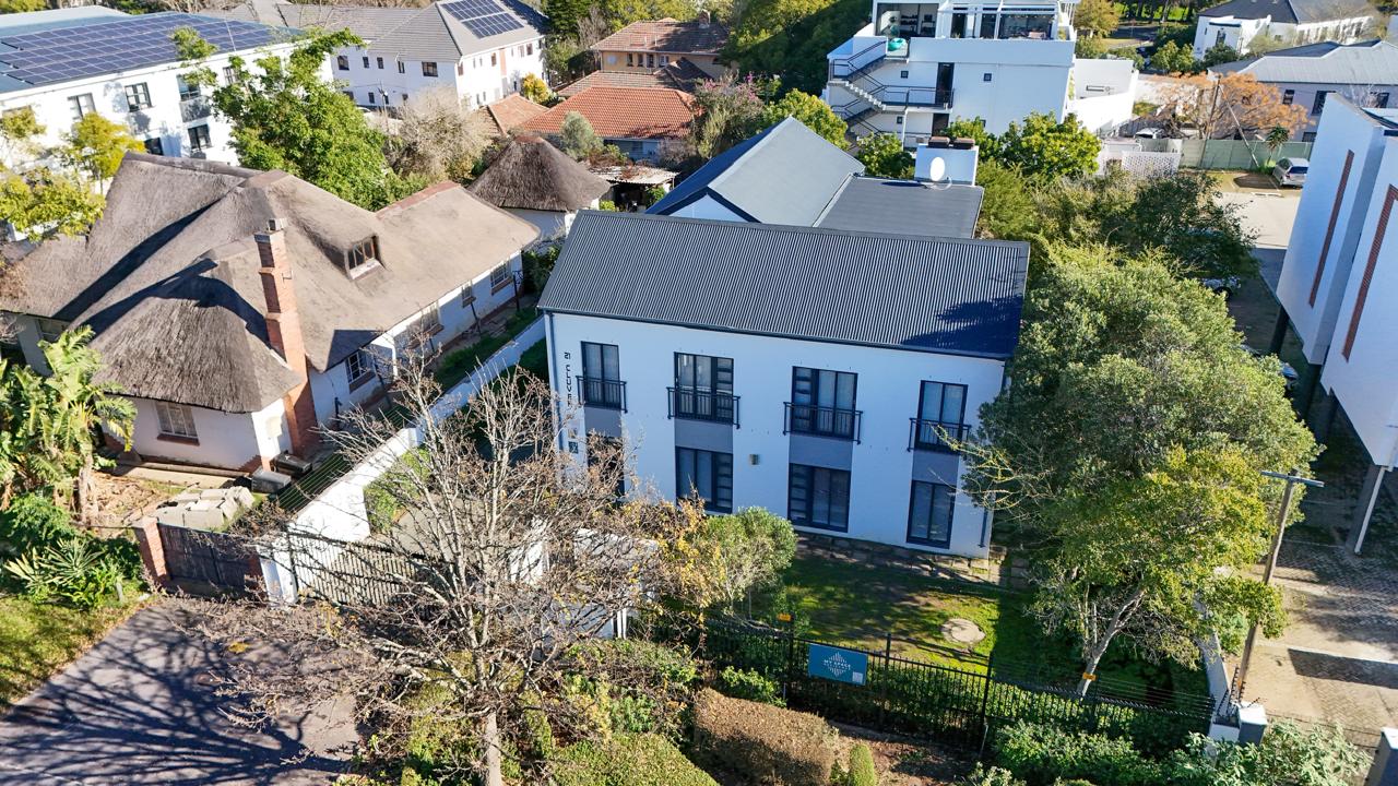 Completed student housing block with rooftop solar and parking, Stellenbosch